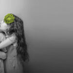 Girl whispering to boy